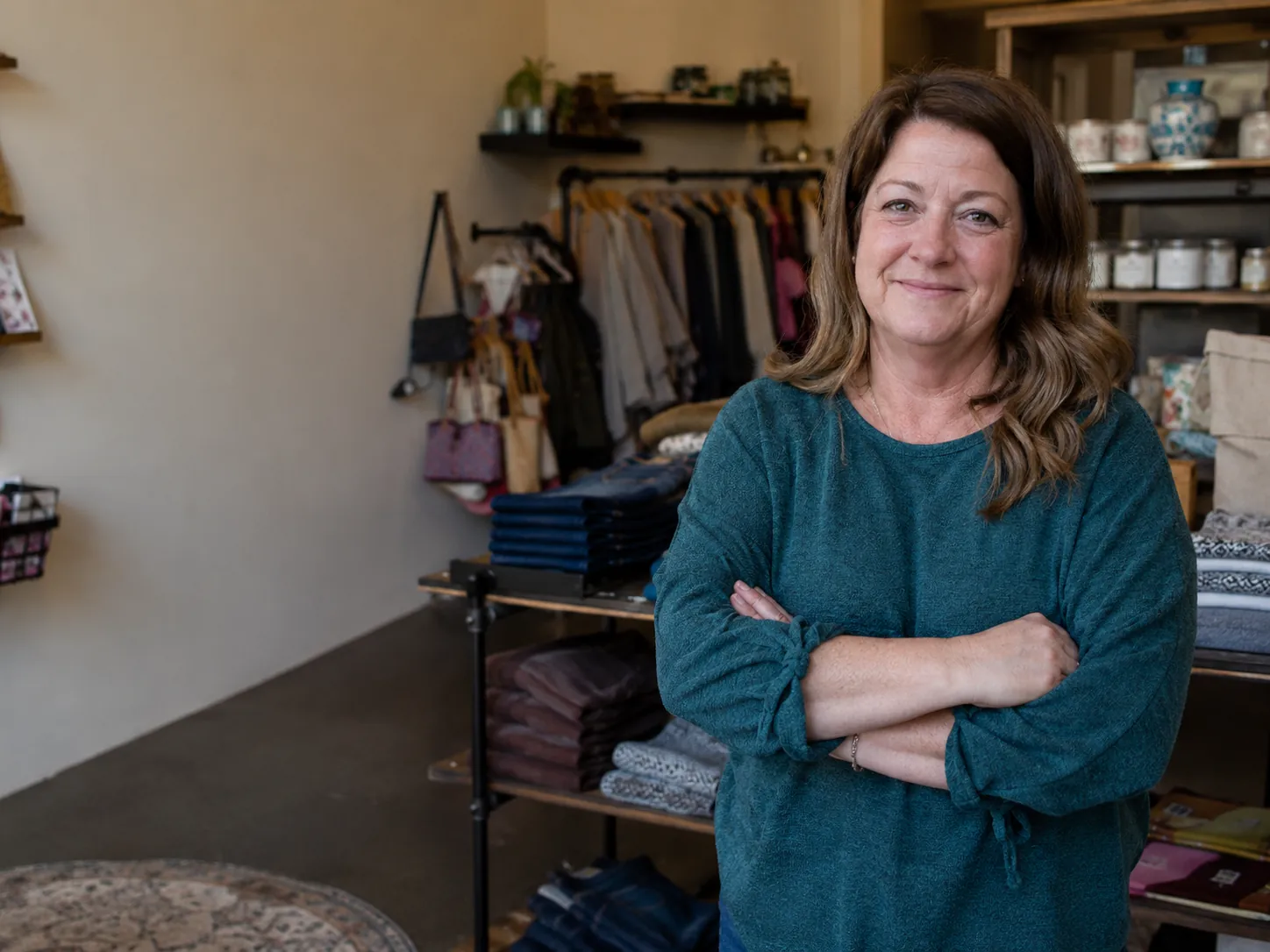 Small boutique storefront owner inside a local retail shop